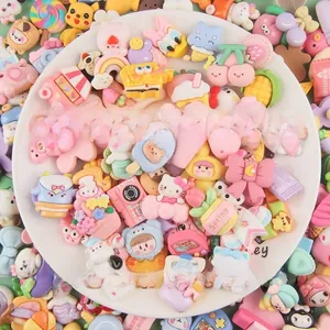 Macro shot of colorful cartoon resin charms including Hello Kitty and Pikachu for DIY crafts