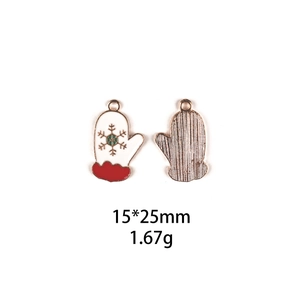 Detail of red and white Christmas glove charm with gold snowflakes and 15x25mm size data