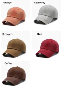 Detail shot of distressed vintage washed cotton baseball caps in multiple retro colors