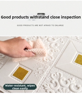 Waterproof 3D foam wall sticker with gold sequins being wiped clean with a sponge