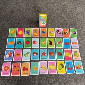 Flat lay of 36 fruit educational flashcards with realistic images and English names