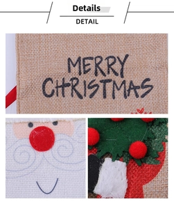 Detail of burlap Christmas wine bag with Merry Christmas text and Santa Claus print