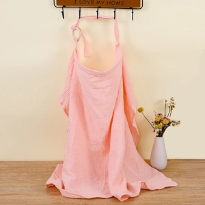 Pink muslin cotton nursing cover with adjustable neck strap and rigid neckline detail