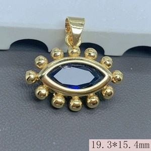 Close-up of gold-plated evil eye pendant with blue zircon and size details (19.3*15.4mm)