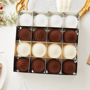Flocked Christmas ball set with geometric textures and neutral tones in a gift box