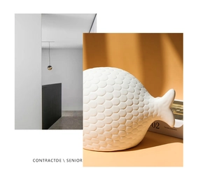 Detalle de estatua de pez de cerámica blanca con escamas en relieve de estilo moderno