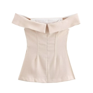 Detailed back view of beige off-shoulder linen top showing texture and zipper
