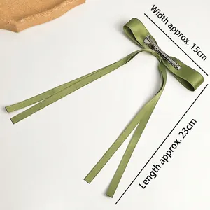 Grass green satin bow hair clip with long ribbons and metal alligator grip, 15x23cm