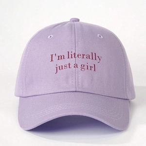 Close-up of I'm literally just a girl embroidery on a lavender cotton baseball cap