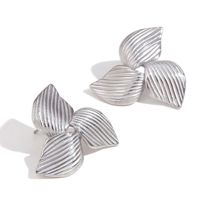 Silver clover stud earrings with vertical texture and minimalist stainless steel design