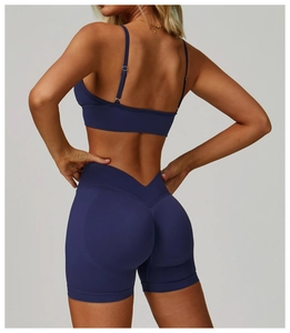 Detail of navy seamless double-strap yoga bra and ribbed shorts set from behind