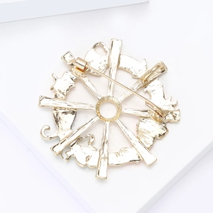 Golden alloy enamel marine style nautical helm brooch pin with cute animal bone design
