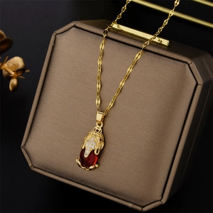 Gold plated titanium steel necklace with red Pi Xiu pendant and sparkling crystals