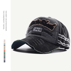 Vintage washed denim baseball cap with 1969 Jamaica embroidery and distressed details