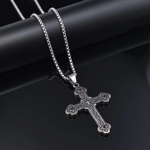 Polished silver Viking cross necklace featuring four purple gemstones on black background