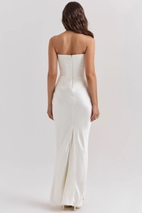 Elegant back view of white strapless satin mermaid dress with bodycon fishtail hem