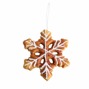 Rustic gingerbread snowflake ornament with white patterns and minimalist hanging rope