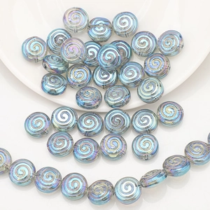 Detail of spiral aurora blue glass beads for DIY jewelry and handmade accessories