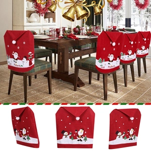 Christmas chair covers featuring Santa and snowman prints for festive dining room decor