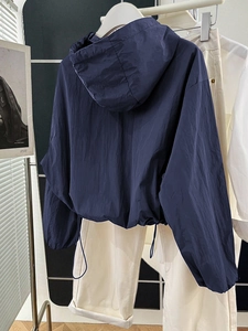 Minimalist solid color long sleeve hooded windbreaker jacket with drawstring hem for women