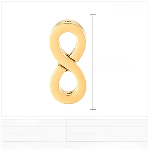 Macro view of 18x8mm stainless steel infinity symbol bead with golden finish