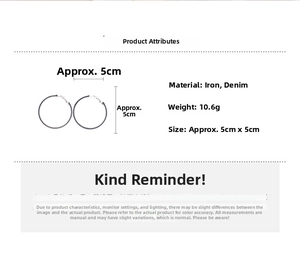 Detail view of denim fabric hoop earrings showing 5cm diameter and 10.6g weight