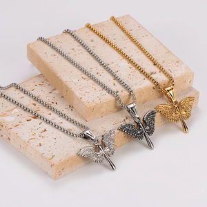 Three-color angel wing cross necklaces in silver, gold, and gunmetal stainless steel