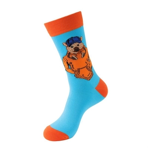 Detail of blue crew socks with orange heel and toe featuring a trendy cartoon bear pattern