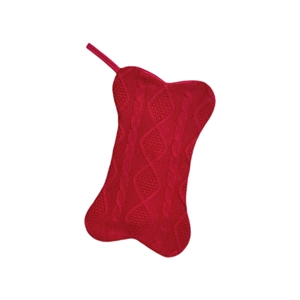 Detailed view of red knitted bone shaped Christmas stocking with hanging loop and pattern