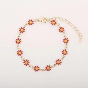 Elegant gold metal bracelet featuring twelve red daisy flowers with adjustable lobster clasp