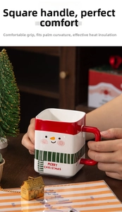 Detail of square ceramic Christmas mug with snowman pattern and heat-resistant handle