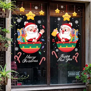 Adesivi natalizi per finestre con Babbo Natale in mongolfiera e decori di stelle