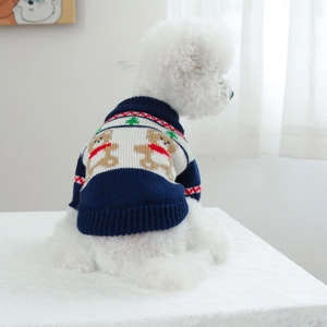 Detail of navy knit pet sweater featuring forest bear patterns and ribbed cuffs for dogs