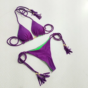 Purple and lime green contrast bikini set with braided straps and fringe tassels
