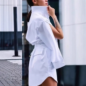 Elegant white long sleeve shirt dress with waist tie and irregular sleeve detail