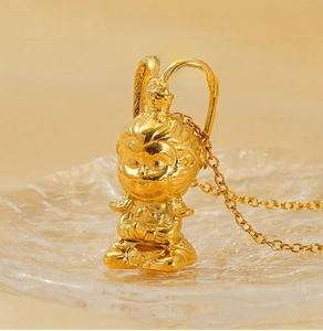 Detailed view of Sun Wukong gold pendant in 3D stainless steel with a fine metal chain
