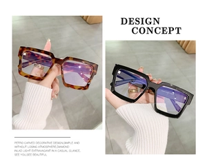 Detailed macro view of retro square tortoise shell and black sunglasses frames