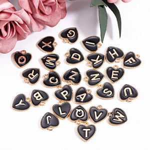 Black heart-shaped alphabet pendants with gold-plated letters for jewelry making