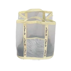 Minimalist white mesh storage basket with handles and 'A Better Life' printed strap
