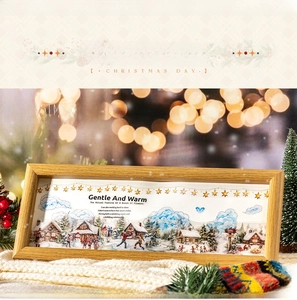 Vista dettagliata di cornice in legno con illustrazione di scena invernale per DIY journal