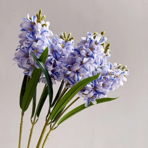 Detailed view of artificial hyacinth flowers with realistic blue and white striped petals