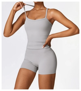 Detail of light grey brushed yoga tank top with thin straps and moisture-wicking fabric