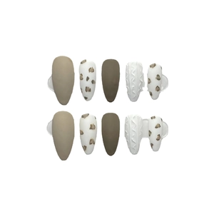 Handmade almond press-on nails featuring matte leopard print and 3D knit texture designs