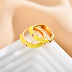 Modern gold-plated yellow enamel hoop earrings with a small central diamond setting