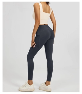 Close-up of high-waisted yoga pants with functional side pocket and squat-proof fabric