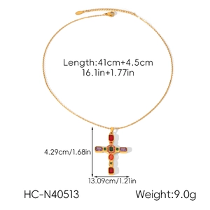 Detail showing dimensions of gold cross necklace with colorful gemstones and 41cm length