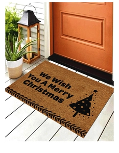 Detailed texture of Christmas coir doormat with Merry Christmas text and tree pattern