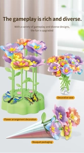 Detail of creative building blocks garden toy set showing floral parts and gift packaging