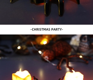 Macro shot of Halloween black spider legs and LED candle light for festive party decor
