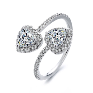 Elegant silver open ring with double heart-shaped crystals and sparkling pave diamond settings